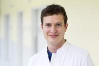 Dr. Lars Grüber